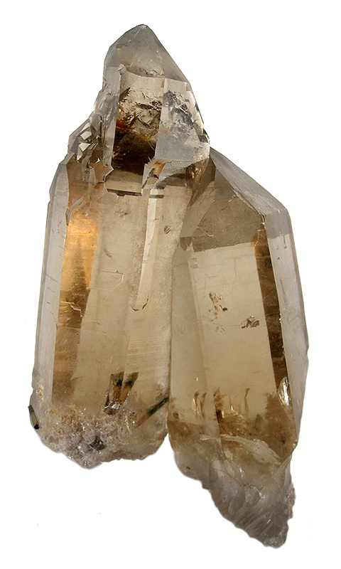 Amber smoky citrine crystals with dark tourmaline inclusions, from Pederneira in Brazil.